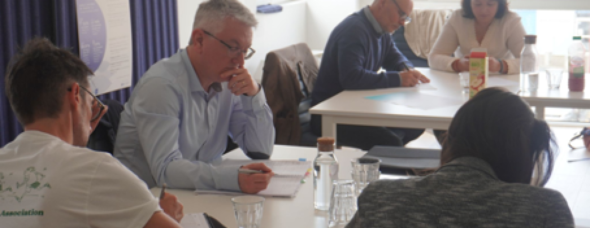 Participants dans une salle